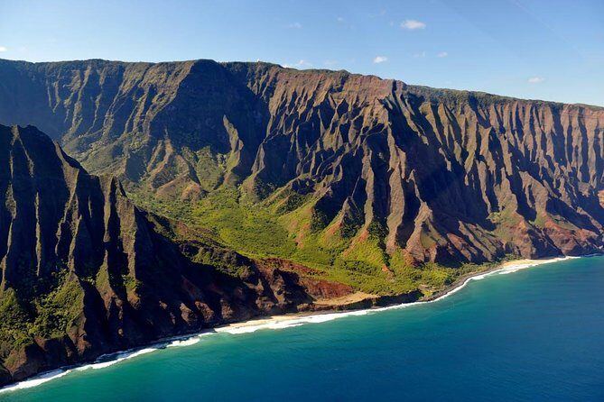 Kauai Cessna Private Air Tour - The Crater walls, wing-tip waterfall views, and Hanalei Valley ribbons
