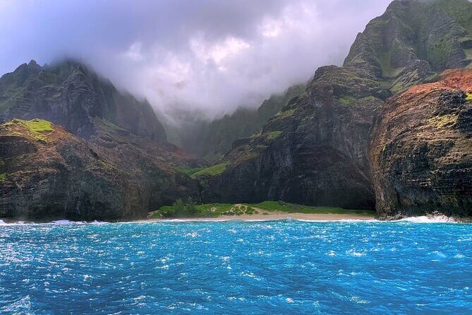 Kauai: NaPali Boat Tour on the Amelia K - NaPali sea caves and remote coves: where the tour turns cinematic
