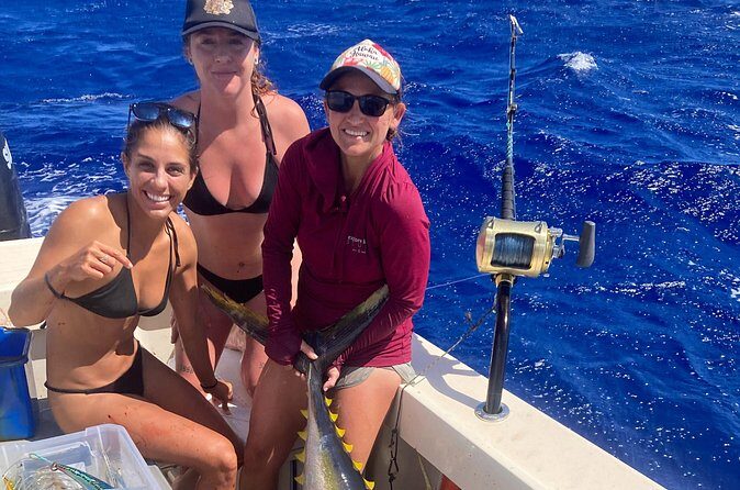 Private Deep Water Fishing in Kauai - Comfort on a rolling boat: restroom, snacks, and real seasickness support