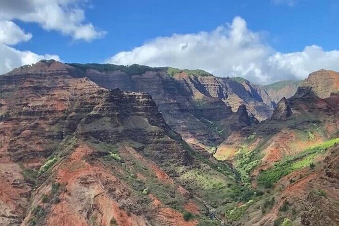 Private Kauai Airplane Tour: Na Pali Coast, Waterfalls & More - Mount Waiʻaleʻale: the rainiest peak and why it shows up in the clouds